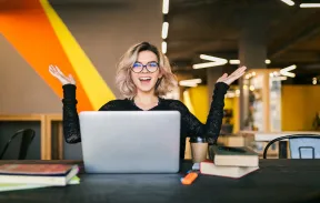 Happy intern at the laptop